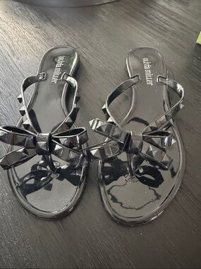 Olivia Miller Black Patent Bow Jelly Flip Flop Sandals